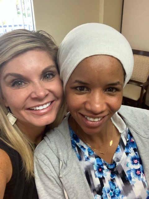 Photo of Jami and Amna smiling senior living