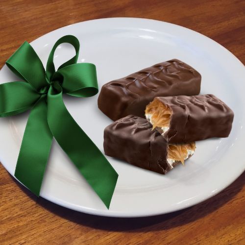 Photo of chocolate bars and a green ribbon Intergenerational activities for seniors at Fellowship Square Surprise