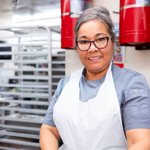 Woman in kitchen at Fellowship Square Mesa