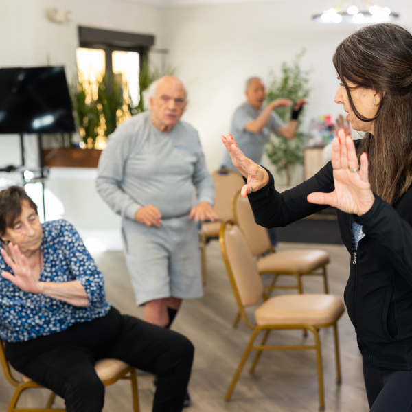 Fitness trainer with residents Independent Living in Downtown Mesa